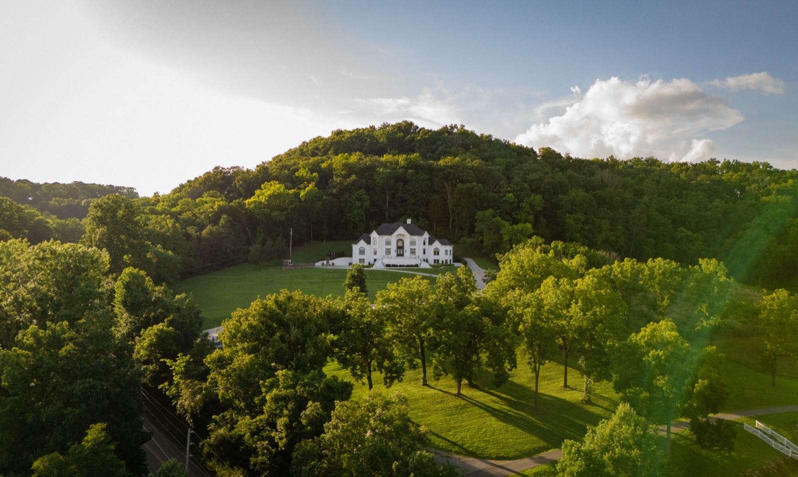 A hilltop held by its own trees