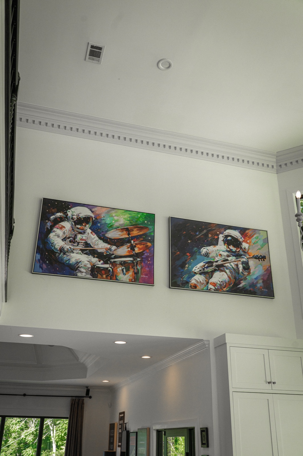 Astronauts on drums and guitar, high over the kitchen