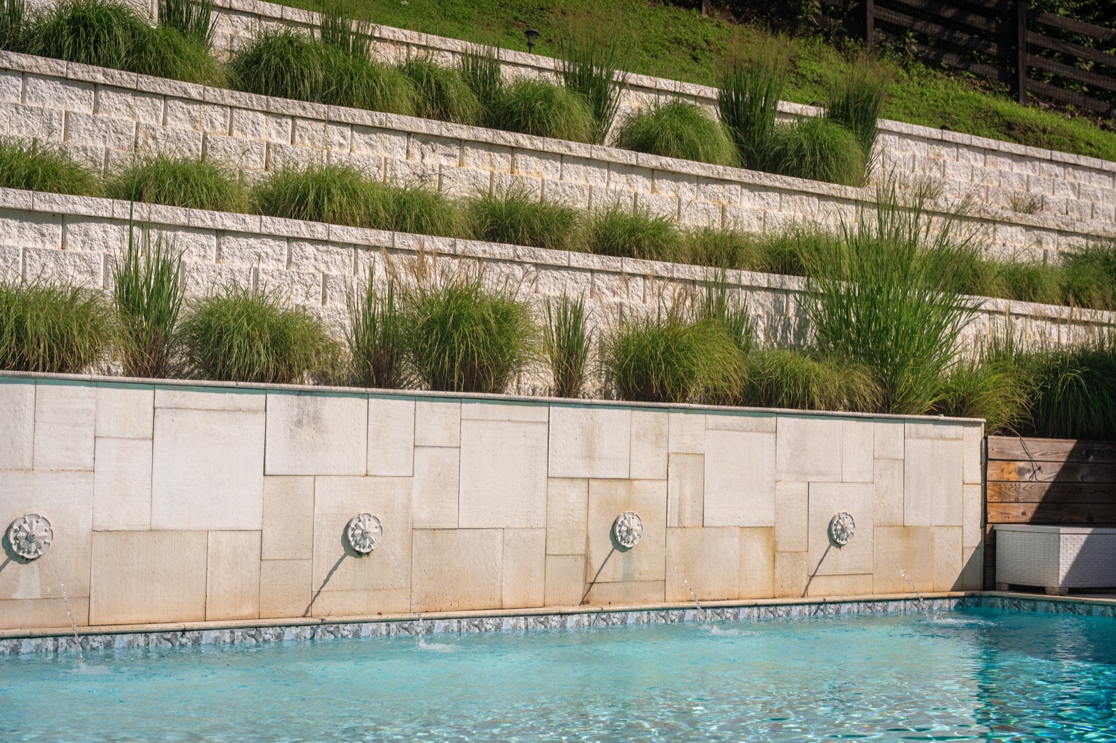 Terraced plantings over the pool deck