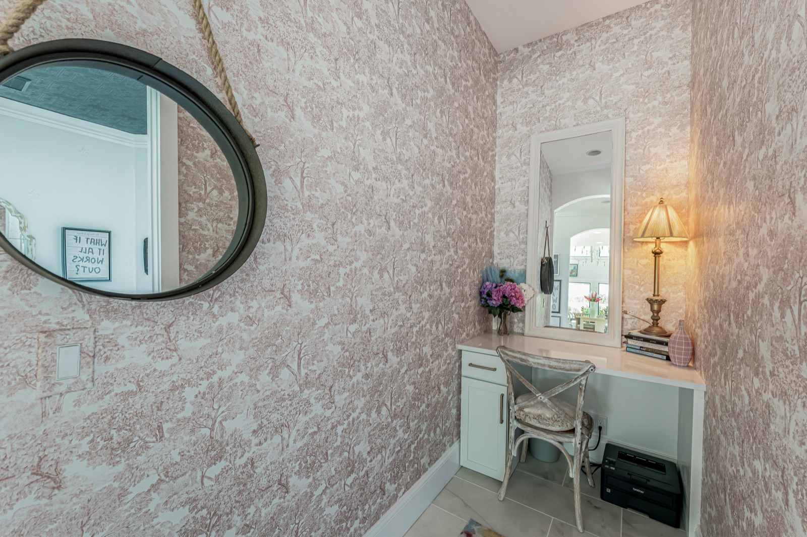 Toile walls and a rope-hung mirror