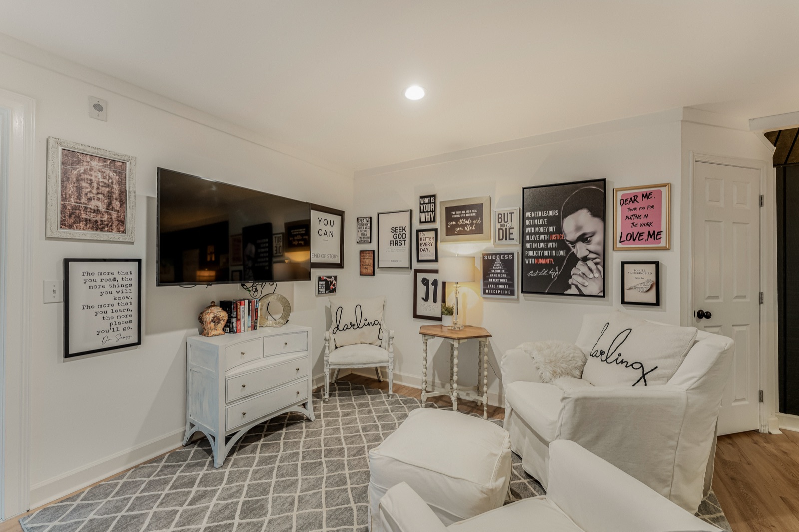 The sitting room keeps its own gallery wall